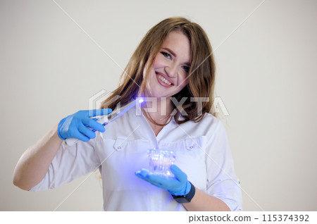 Sterile instruments are in the dentist's office. The mirror and the layout of the jaw lie on the table of the orthodontist. Oral hygiene, caries prevention, examination. 115374392