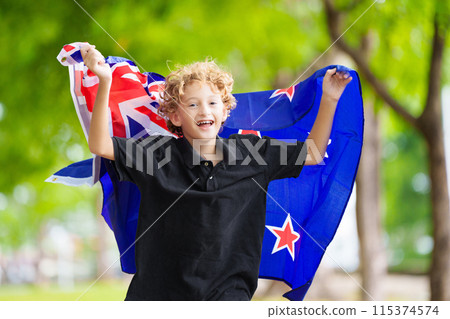 Child running with New Zealand flag. Kiwi fan Child running with New Zealand flag. Kiwi fan 115374574