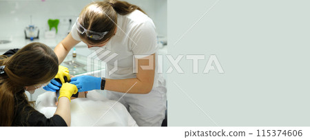 dental treatment in dentistry blue yellow gloves doctor and nurse assistant Dental Tools Demonstrating Mouth Mirror, Probe And Stainless Tweezers, Creative Banner For Quality Stomatological Services 115374606
