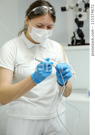 saline gloves dentistry The nurse collects the saline solution of sodium chloride from the bottle into the syringe. Antibiotic breeding, vaccination, prevention and treatment of diseases saline gloves dentistry The nurse collects the saline solution of sodium chloride from the bottle into the syringe. Antibiotic breeding, vaccination, prevention and treatment of diseases 115374672