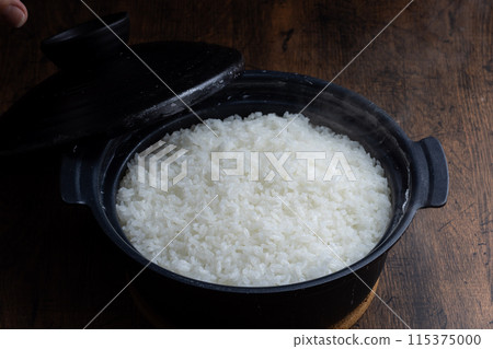 Freshly cooked rice in a clay pot Japanese food Freshly cooked rice in a clay pot Japanese food 115375000