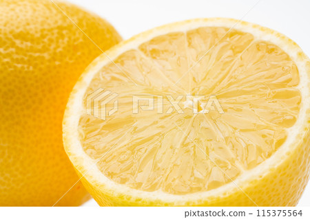 Close-up of a cross section of a juicy lemon Close-up of a cross section of a juicy lemon 115375564