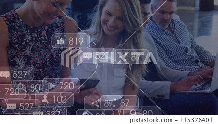 Image of social media icons with numbers over diverse people using smartphone Image of social media icons with numbers over diverse people using smartphone 115376401