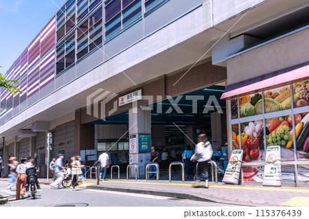 Kawasaki cityscape in June, Japan. View of Tokyu Railway's Shin-Maruko Station and other areas. Kawasaki cityscape in June, Japan. View of Tokyu Railway's Shin-Maruko Station and other areas. 115376439
