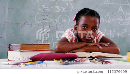 Image of mathematical equations floating over schoolchild sitting at desk, leaning on books and look Image of mathematical equations floating over schoolchild sitting at desk, leaning on books and look 115376699