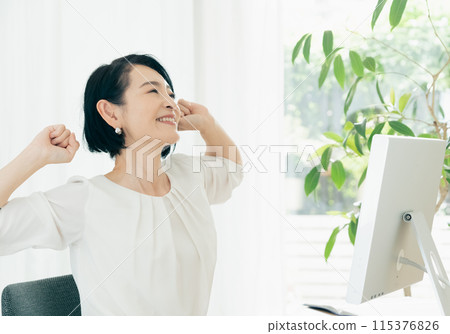 A growing middle-aged woman 115376826