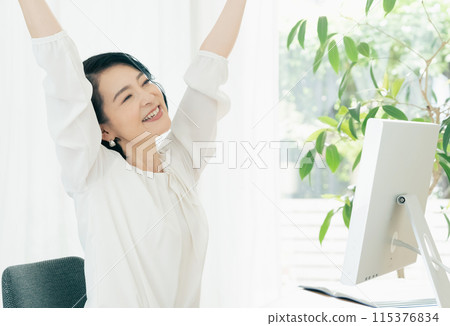 A growing middle-aged woman A growing middle-aged woman 115376834