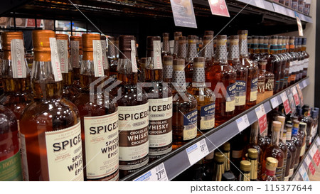 Display sale of wine and whisky bottles in BC Liquor store. Display sale of wine and whisky bottles in BC Liquor store. 115377644