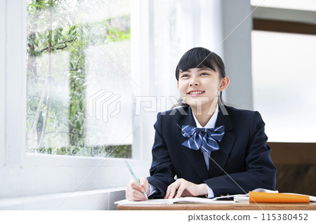 Junior high school girls taking classes 115380452