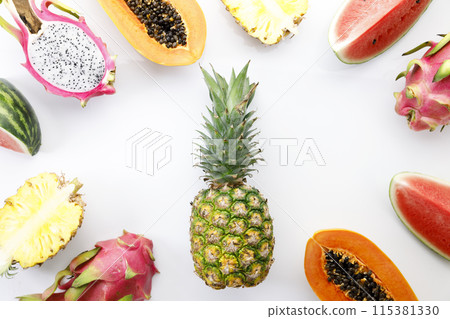 Creative layout made of fruits. Watermelon, pineapple, dragon fruit and papaya on white background. 115381330