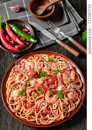 shrimp fra diavolo with spaghetti on a plate shrimp fra diavolo with spaghetti on a plate 115381732