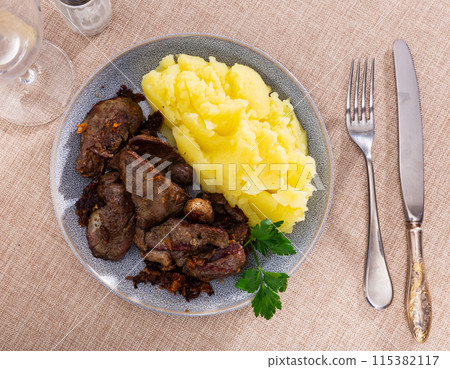 Chicken liver served with puree on plate Chicken liver served with puree on plate 115382117