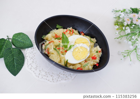 mashed potatoes with eggs as a background mashed potatoes with eggs as a background 115383256