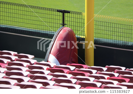 Mazda Stadium's left field seating and a spike-shaped object sticking out Mazda Stadium's left field seating and a spike-shaped object sticking out 115383927