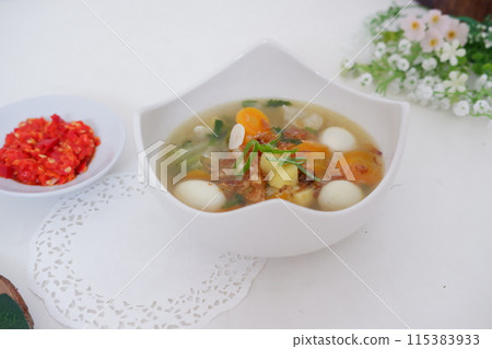 delicious quail egg soup as background 115383933