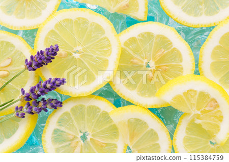 Acrylic ice and carbonated water blue with lemon and lavender background 115384759