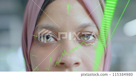 Image of financial data processing over biracial businesswoman in hijab in office 115384980
