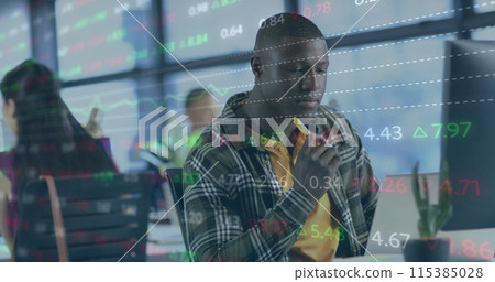 Image of financial data processing over african american businessman working in office 115385028