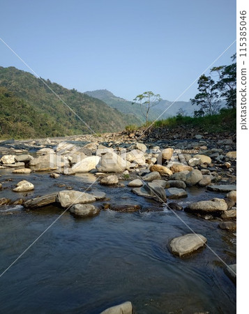 view of the river with rocks view of the river with rocks 115385046