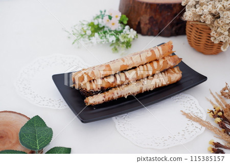 Delicious Tiramisu Banana Roll as a Background 115385157