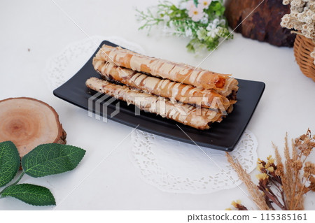 Delicious Tiramisu Banana Roll as a Background 115385161