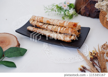 Delicious Tiramisu Banana Roll as a Background 115385167