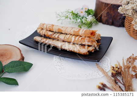 Delicious Tiramisu Banana Roll as a Background 115385171