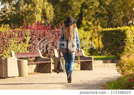 Back view of stylish woman on air 115386024