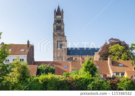 The bell tower of St Salvators Cathedral located in Bruges, Belgium 115386582