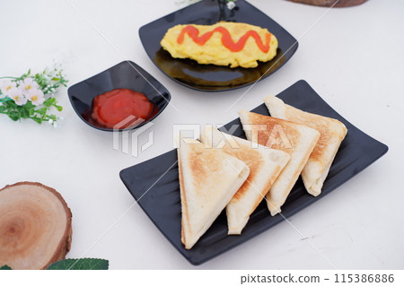 delicious toast and omelet as a background 115386886