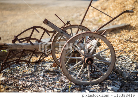 Vintage plow made from wood and steel on the farm ground Vintage plow made from wood and steel on the farm ground 115388419