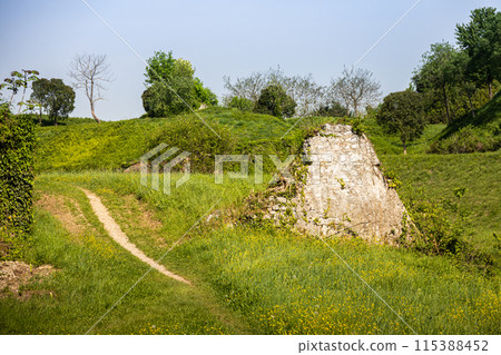 Old fort ruined wall with path around the town, Palmanova, Italy Old fort ruined wall with path around the town, Palmanova, Italy 115388452