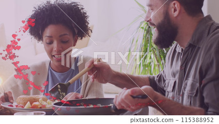 Image of hearts ove diverse couple eating together Image of hearts ove diverse couple eating together 115388952