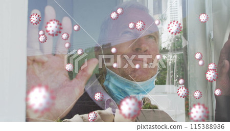 Image of virus cells over happy senior caucasian man with face mask 115388986