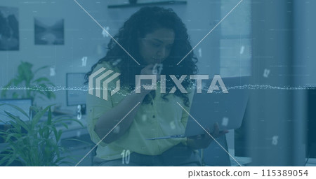 Image of numbers changing over biracial woman with computer in office Image of numbers changing over biracial woman with computer in office 115389054
