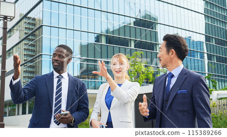 A Japanese businessman guiding a foreign business person around town A Japanese businessman guiding a foreign business person around town 115389266
