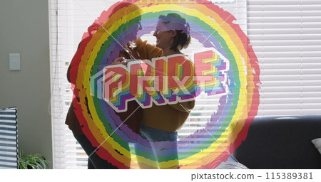 Image of rainbow and pride over lesbian couple drinking coffee Image of rainbow and pride over lesbian couple drinking coffee 115389381