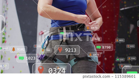 Image of media icons over caucasian woman on climbing wall 115389601