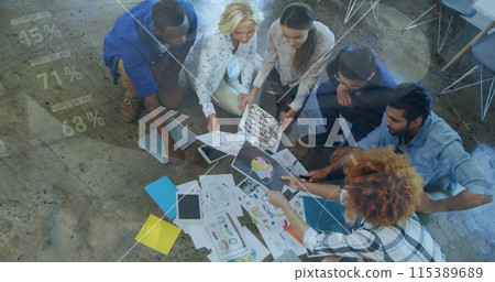 Image of data processing over diverse business people discussing work 115389689
