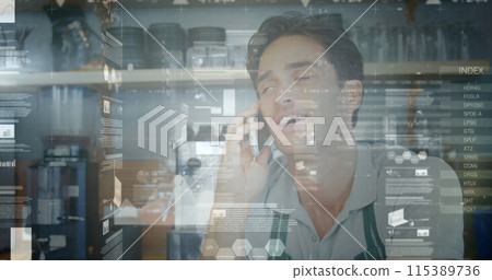 Image of data processing over caucasian businessman talking on smartphone Image of data processing over caucasian businessman talking on smartphone 115389736