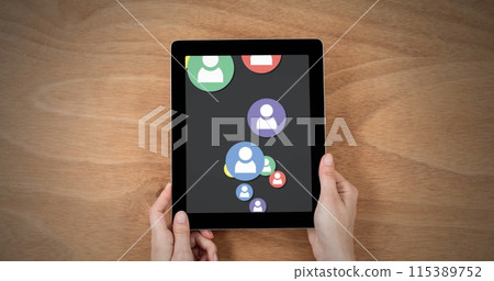 Image of media icons over hands with tablet Image of media icons over hands with tablet 115389752