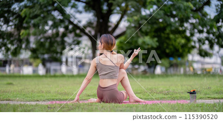 Woman Practice Yoga in Park. Healthy Lifestyle, Outdoor Exercise, Stretching, and Relaxation in Nature 115390520