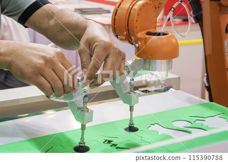 The engineer setup the robotic arm. 115390788