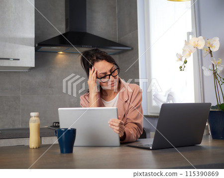 Businesswoman working at home - stress - period Businesswoman working at home - stress - period 115390869