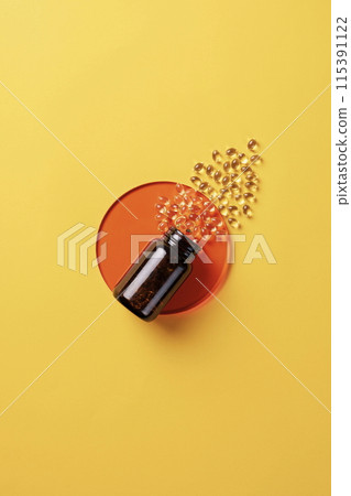 the yellow pills pouring out of the vat the yellow pills pouring out of the vat 115391122