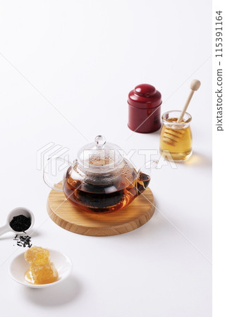 a warm glass teapot a warm glass teapot 115391164