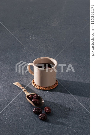 a cup of traditional jujube tea that feels healthy 115391175