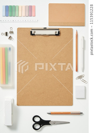 clipboards and office supplies on a white background 115391228