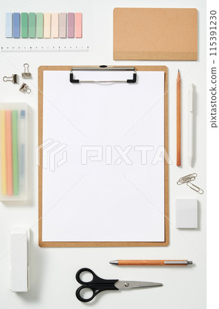clipboards and office supplies on a white background 115391230
