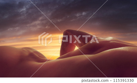 Sunset Silhouettes. Beauty of human body forming mountain landscape during warm glow of the setting sun. Connection between human form and nature Sunset Silhouettes. Beauty of human body forming mountain landscape during warm glow of the setting sun. Connection between human form and nature 115391330